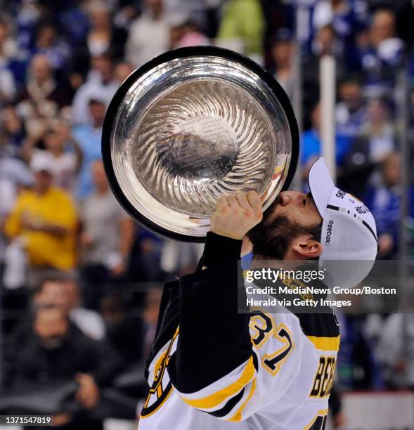 https://media.gettyimages.com/id/1371547819/photo/boston-bruins-center-patrice-bergeron-kisses-the-stanley-cup-as-he-celebrates-winning-the.jpg?s=612x612&w=gi&k=20&c=T9WD4yQiKaLP8M_7umxW1PWSWnWslTsoaPRP6EIvccE=