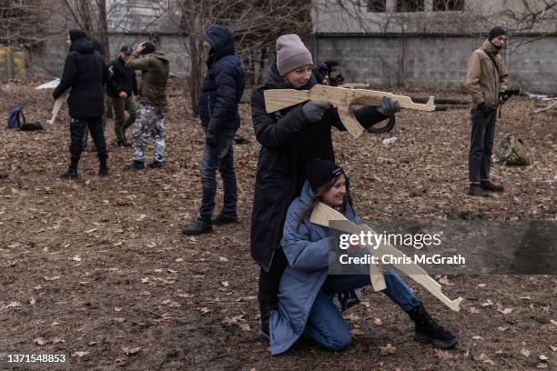 Civilians take part in a military training course conducted by a Christian Territorial Defence Unit on February 19, 2022 in Kyiv, Ukraine. Across...