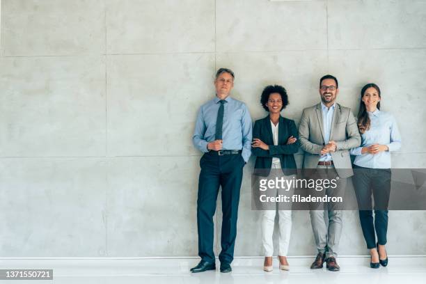 multi ethnic business team - organised group photo stock pictures, royalty-free photos & images