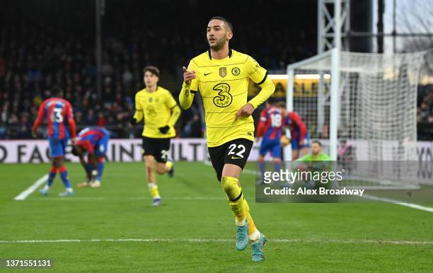 Hakim Ziyech of Chelsea celebrates after scoring their team's first goal during the Premier League match between Crystal Palace and Chelsea at...