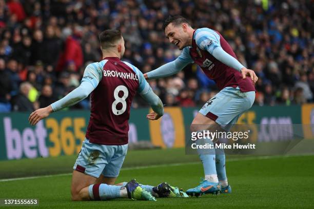 Josh Brownhill of Burnley celebrates with team mate Connor Roberts after scoring their team's 2nd goal during the Premier League match between...