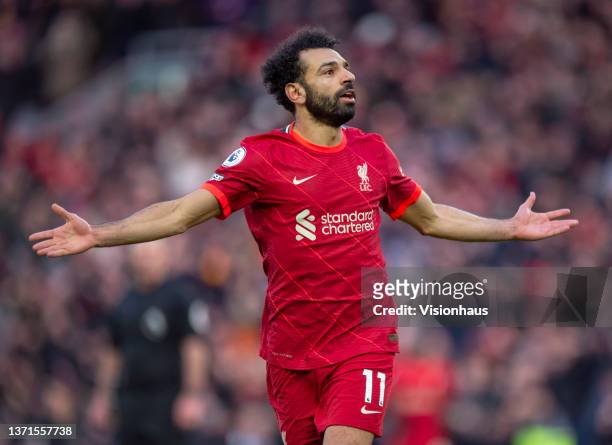 Mohamed Salah of Liverpool celebrates scoring his team's second goal and his one hundred and fiftieth goal for the club during the Premier League...