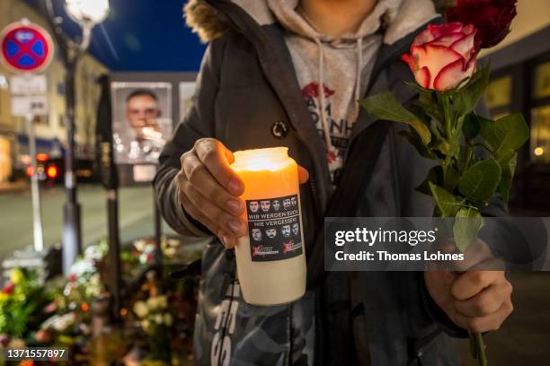 People commemorate in front the victims of the 2020 mass shooting at the first crime scene on February 19, 2022 in Hanau, Germany. On February 19,...