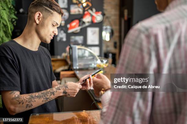 checkout at the barbershop - salon de the stock pictures, royalty-free photos & images