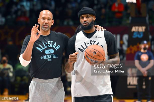 Head coach Monty Williams talks with LeBron James of Team LeBron during the NBA All-Star practice at the Wolstein Center on February 19, 2022 in...