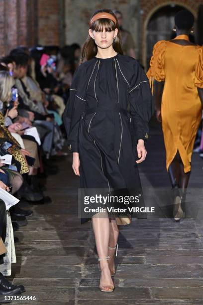 Model walks the runway during the Eudon Choi Ready to Wear Fall/Winter 2022-2023 fashion show as part of the London Fashion Week on February 19, 2022...