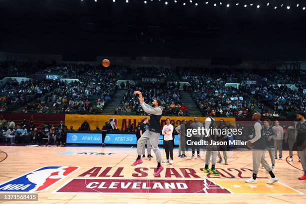 Rudy Gobert shoots a half-court shot during the NBA All-Star practice at the Wolstein Center on February 19, 2022 in Cleveland, Ohio. NOTE TO USER:...