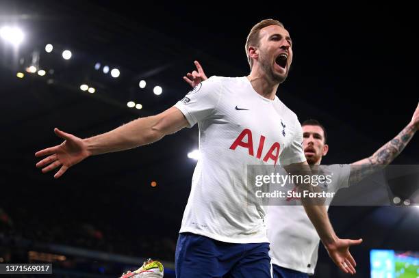 Harry Kane of Tottenham Hotspur celebrates after scoring their side's second goal during the Premier League match between Manchester City and...