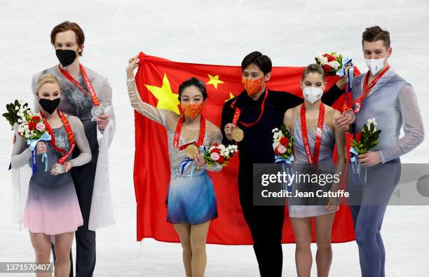 Gold medallists Wenjing Sui and Cong Han of Team China , Silver Medallists Evgenia Tarasova and Vladimir Morozov of Team ROC and Bronze Medallists...