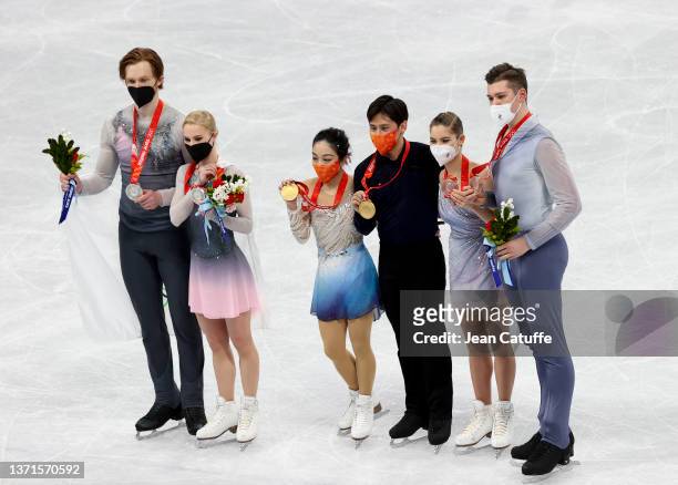 Gold medallists Wenjing Sui and Cong Han of Team China , Silver Medallists Evgenia Tarasova and Vladimir Morozov of Team ROC and Bronze Medallists...