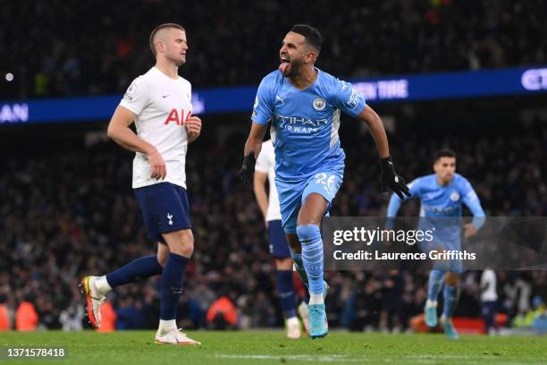 Riyad Mahrez of Manchester City celebrates after scoring their team's second goal from the penalty spot during the Premier League match between...