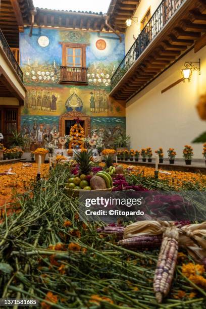 an altar in the day of the dead in patzcuaro michoacán - pan de muerto stockfoto's en -beelden