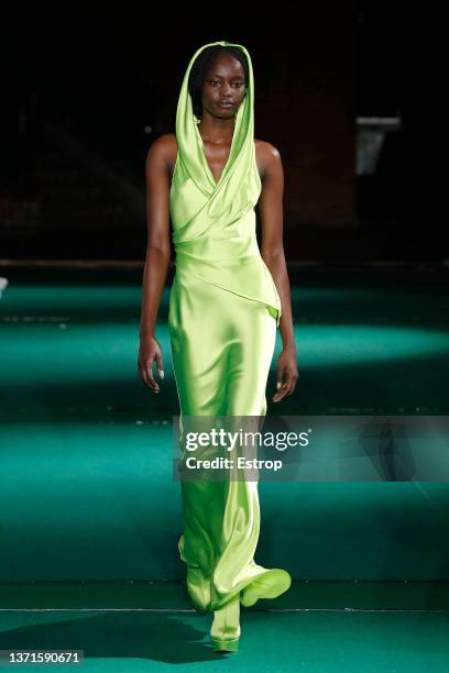 Model walks the runway at the HALPERN show during London Fashion Week February 2022 on February 19, 2022 in London, United Kingdom.