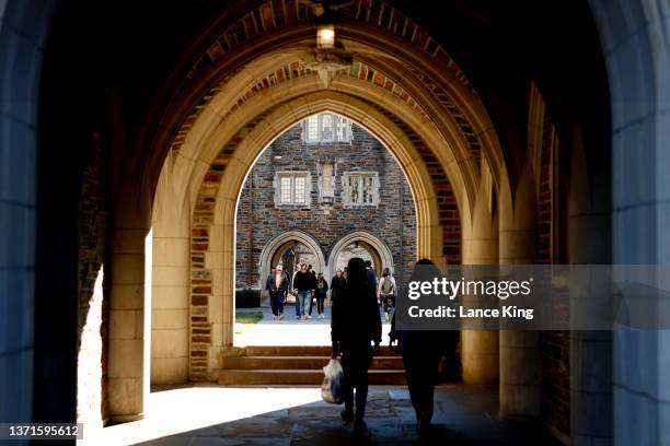 People walk through the campus of Duke University ahead of the game between the Florida State Seminoles and the Duke Blue Devils on February 19, 2022...