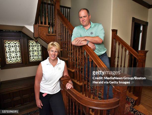 The Ashmont section... Here, new homeowners Susan Istock and Tom Hanlon at their Carruth street home