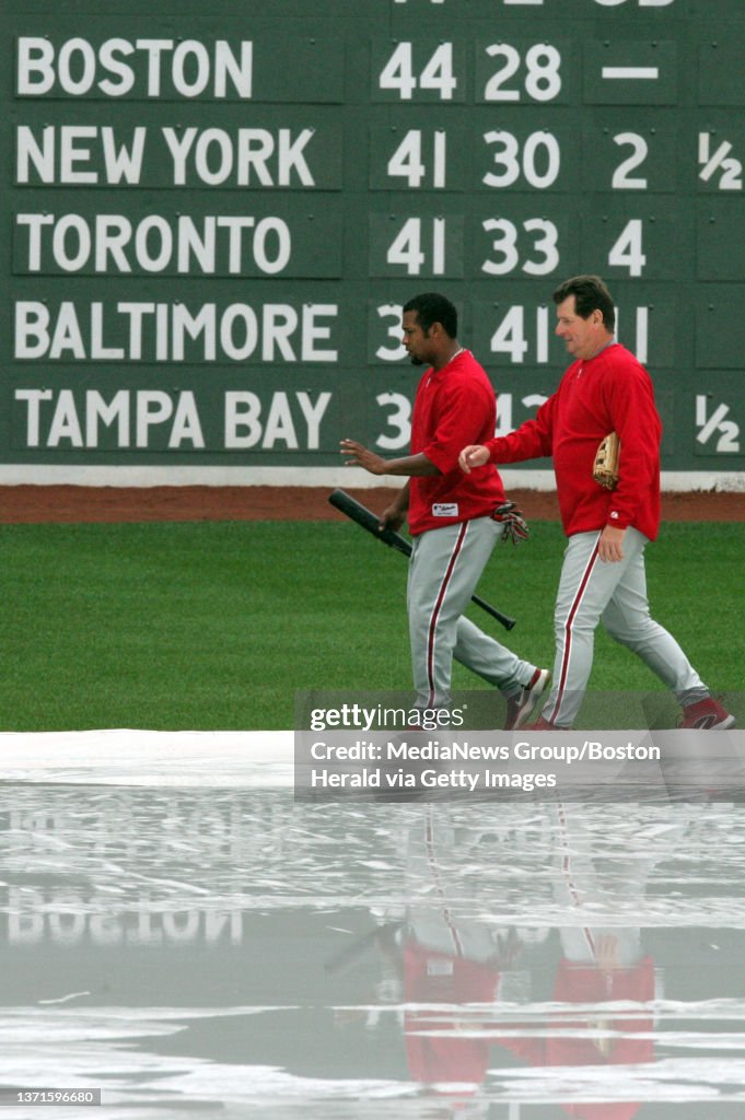 3 Rd Base Coach Phillies Abraham Nuûez, left, walks with 3rd base coach Bill Dancy ...