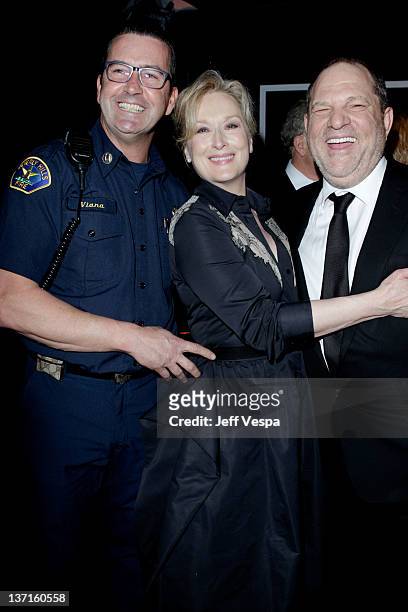 Beverly Hills Fire Captain Dean Viana, actress Meryl Streep and producer Harvey Weinstein attend The Weinstein Company's 2012 Golden Globe Awards...