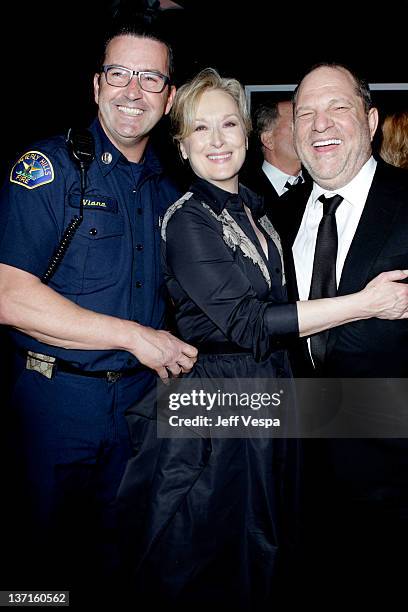 Beverly Hills Fire Captain Dean Viana, actress Meryl Streep and producer Harvey Weinstein attend The Weinstein Company's 2012 Golden Globe Awards...