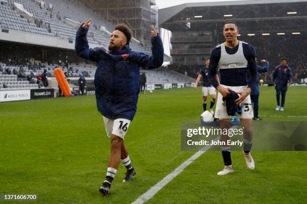 Sorba Thomas andJon Russell of Huddersfield Town celebrates the win with the travelling supporters after the Sky Bet Championship match between...