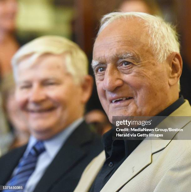 Former President of the Massachusetts Senate William Bulger and former Attorney General Francis X. Bellotti smile while listening to one of several...