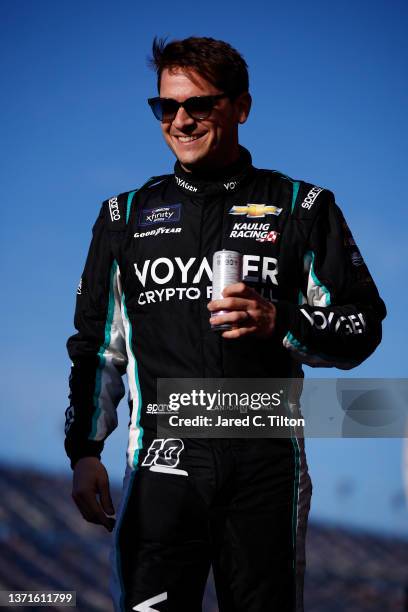 Landon Cassill, driver of the Voyager: Crypto for All Chevrolet, walks onstage during the driver intros prior to the NASCAR Xfinity Series Beef. It's...