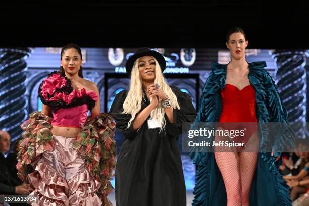 Designer Tawa Atanda walks the runway duringTáWA at the House of Ikons show during London Fashion Week February 2022 on February 19, 2022 in London,...