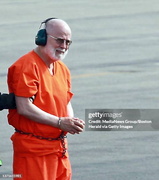 Whitey Bulger is taken from a Coast Guard helicopter to an awaiting Sherif vehicle after attending federal court in Boston. Thursday, June 30, 2011.