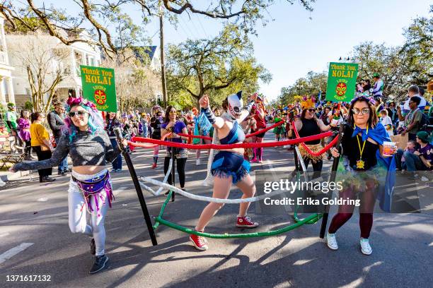 Lucha Krewe participates in the 2022 Krewe of Freret parade on February 19, 2022 in New Orleans, Louisiana. 2021 Mardi Gras parades were cancelled in...
