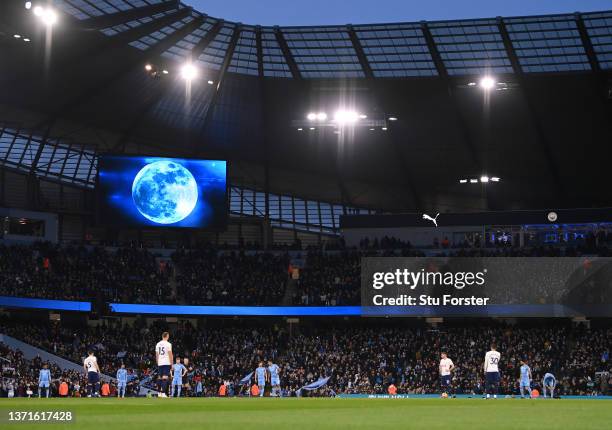 The Blue Moon appears on the big screen as the fans 'Blue Moon' prior to the Premier League match between Manchester City and Tottenham Hotspur at...