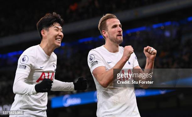 Spurs player Harry Kane celebrates with Son Heung-min after scoring the second Tottenham goal during the Premier League match between Manchester City...