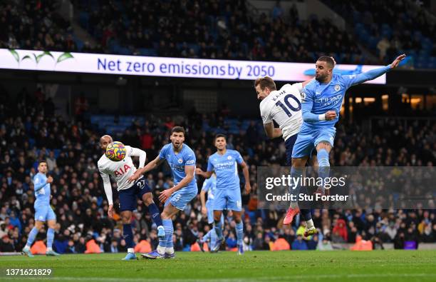 Spurs player Harry Kane heads to score the third Tottenham goal during the Premier League match between Manchester City and Tottenham Hotspur at...