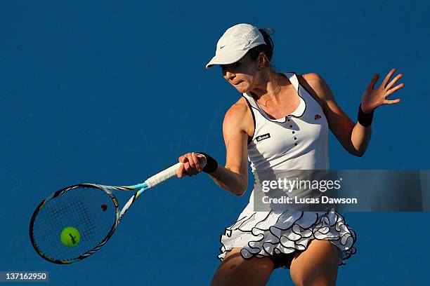 Galina Voskoboeva of Kazakhstan plays a forehand in her first round match against Yanina Wickmayer of Belgium during day one of the 2012 Australian...