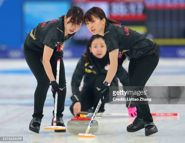 Yurika Yoshida, Satsuki Fujisawa and Yumi Suzuki of Team Japan compete during the Women's Gold Medal match between Team Japan and Team Great Britain...