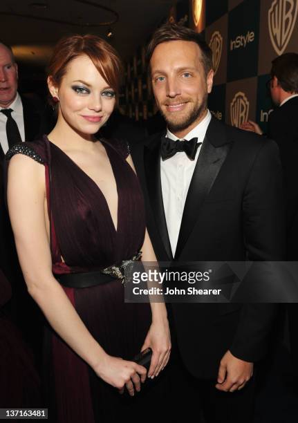Actress Emma Stone and Editor of InStyle Ariel Foxman attend the InStyle and Warner Bros. 69th Annual Golden Globe Awards Post-Party at The Beverly...