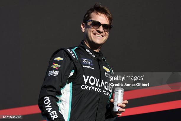 Landon Cassill, driver of the Voyager: Crypto for All Chevrolet, walks onstage during driver intros prior to the NASCAR Xfinity Series Beef. It's...