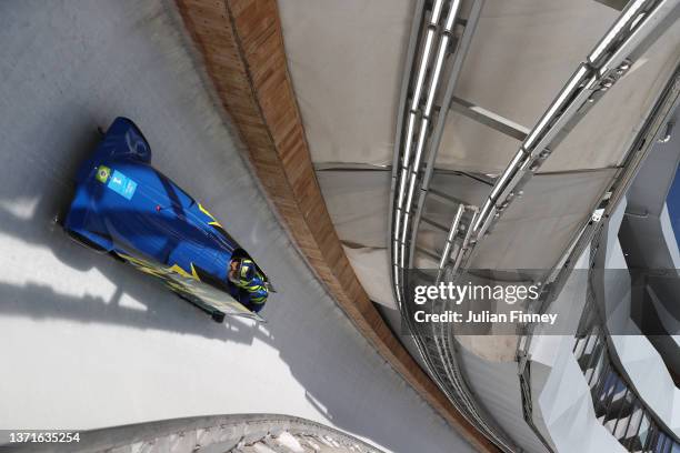 Edson Luques Bindilatti, Rafael Souza da Silva, Erick Gilson Vianna Jeronimo and Edson Ricardo Martins of Team Brazil slide during the four-man...