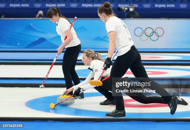 Hailey Duff, Vicky Wright and Jennifer Dodds of Team Great Britain compete during the Women's Gold Medal match between Team Japan and Team Great...