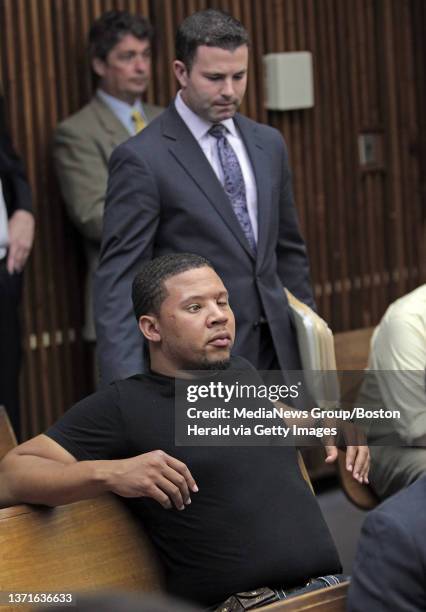 Attorney Joseph J Higgins III walks up to his client, Alexander Bradley who was allegedly shot in the face by former New England Patriots Aaron...
