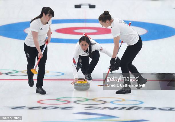 Hailey Duff, Eve Muirhead and Jennifer Dodds of Team Great Britain compete during the Women's Gold Medal match between Team Japan and Team Great...