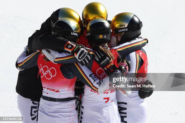 Team Germany celebrates their Silver medal win in the Mixed Team Parallel Big Final on day 16 of the Beijing 2022 Winter Olympic Games at National...