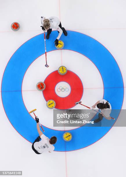 Jennifer Dodds, Vicky Wright and Hailey Duff of Team Great Britain compete during the Women's Gold Medal match between Team Japan and Team Great...