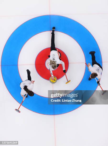 Hailey Duff, Vicky Wright and Jennifer Dodds of Team Great Britain compete during the Women's Gold Medal match between Team Japan and Team Great...