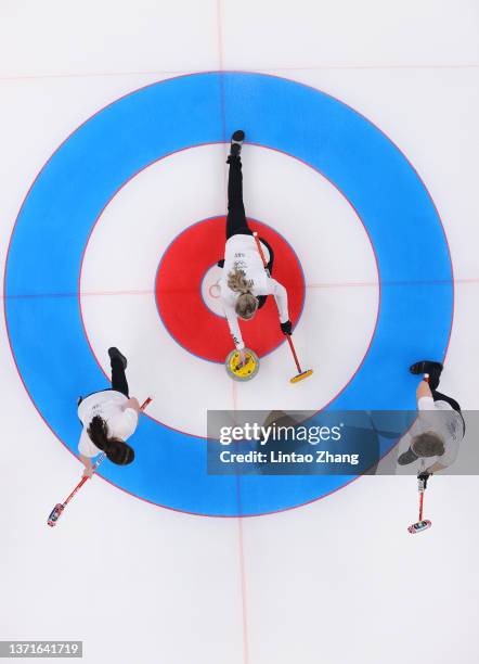 Hailey Duff, Vicky Wright and Jennifer Dodds of Team Great Britain compete during the Women's Gold Medal match between Team Japan and Team Great...