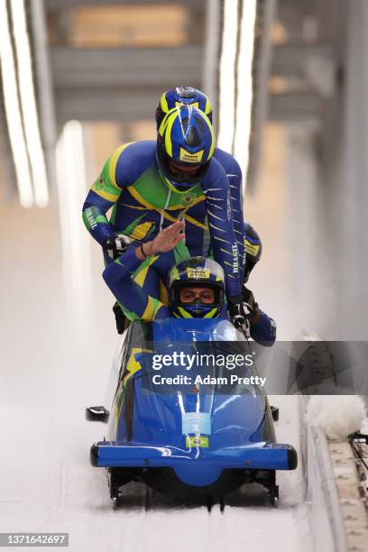 Edson Luques Bindilatti, Rafael Souza da Silva, Erick Gilson Vianna Jeronimo and Edson Ricardo Martins of Team Brazil react to their slide during the...