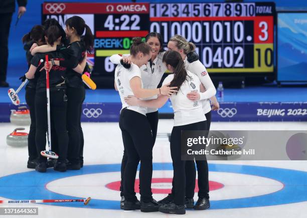 Jennifer Dodds, Eve Muirhead, Hailey Duff and Vicky Wright of Team Great Britain celebrate after defeating Team Japan in the Women's Gold Medal match...