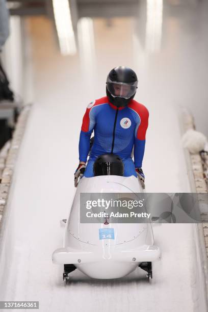 Maxim Andrianov, Aleksey Zaytsev, Vladislav Zharovtsev and Dmitrii Lopin of Team ROC finish their slide during the four-man Bobsleigh heat 4 on day...