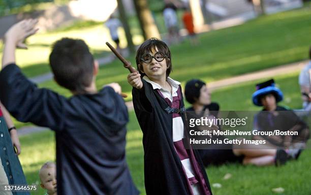 Cambridge, MA. Harry Potter look alike Andrew Termini of Medford, acts out a scene from the movie with a friend at a party and concert in Harvard...