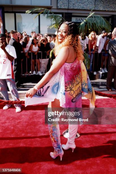 Rapper Trina poses for photos on the red carpet outside the Kodak Theater during the 2nd Annual BET Awards in Hollywood, California on June 26, 2002.