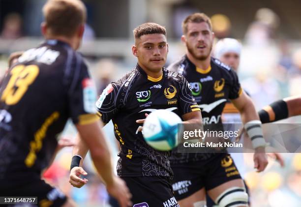 Reesjan Pasitoa of the Force passes during the round one Super Rugby Pacific match between the ACT Brumbies and the Western Force at GIO Stadium on...