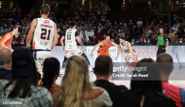 Fans back watching Tad Dufelmeier of the 36ers and Mirko Djeric of the Cairns Taipans during the round 12 NBL match between Adelaide 36ers and Cairns...